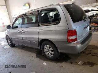 2004 Kia Sedona LX with VIN KNDUP131946569536, listed as a Copart auction lot 82963493 with 119,901 mi miles and Clean Title. Bid and sale history available at carsss.com. Image 2.