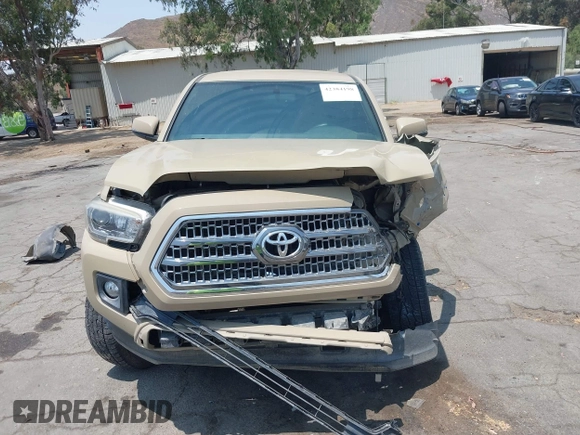 2017 Toyota Tacoma SR5 z VIN 3TMAZ5CN8HM039863, wystawiony jako IAAI lot #42384198 z przebiegiem 53 142 mil mil oraz . Historia ofert i sprzedaży dostępna na DreamBid. Obrazek 13.