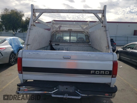 1992 Ford F-150 with VIN 1FTEX14N3NKB14423, listed as a Copart auction lot 77404624 with 287,507 mi miles and Salvage Title. Bid and sale history available at carsss.com. Image 6.