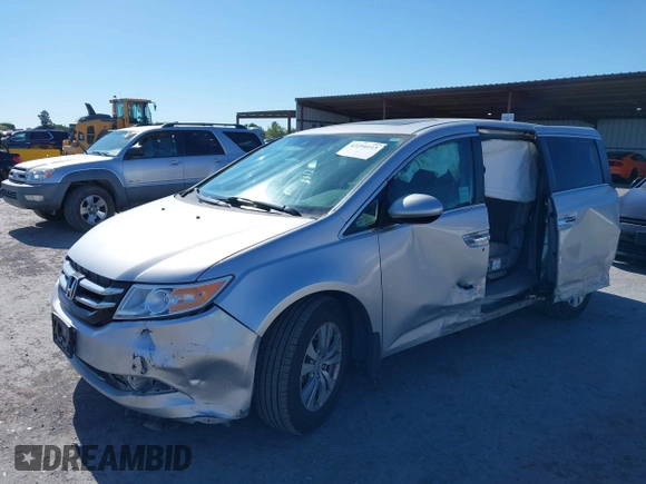 2014 Honda Odyssey EX-L with VIN 5FNRL5H63EB041106, listed as a IAAI auction lot 42294113 with 122,610 mi miles and . Bid and sale history available at DreamBid. Image 6.