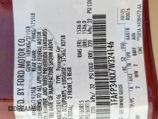 2007 Ford Focus S z VIN 1FAFP34NX7W324146, wystawiony jako Copart lot #59006755 z przebiegiem 160 398 mil mil oraz Szkoda całkowita • Salvage title. Historia ofert i sprzedaży dostępna na DreamBid. Obrazek 12.
