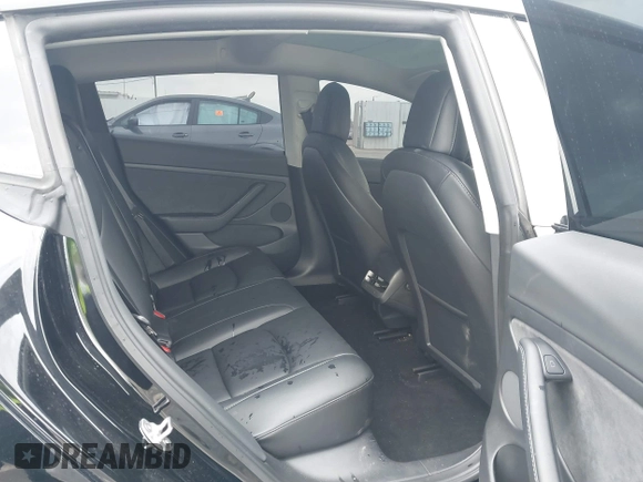 2022 Tesla Model 3 Performance with VIN 5YJ3E1EC3NF248534, listed as a IAAI auction lot 41882694 with 55,415 mi miles and . Bid and sale history available at carsss.com. Image 8.