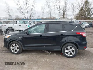 2016 Ford Escape SE with VIN 1FMCU9GX0GUC86844, listed as a IAAI auction lot 42046081 with 95,319 mi miles. Bid and sale history available at carsss.com. Image 14.