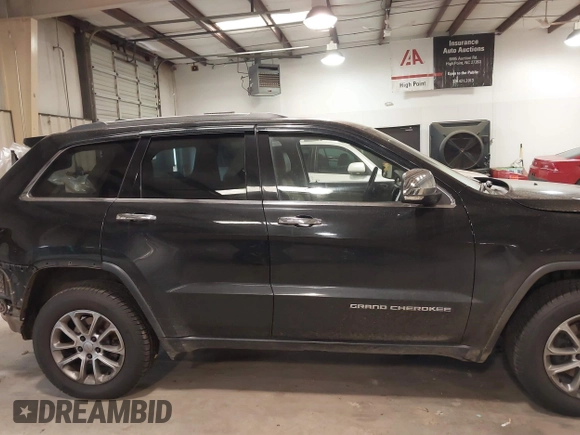 2015 Jeep Grand Cherokee Limited with VIN 1C4RJFBGXFC205124, listed as a IAAI auction lot 41405059 with 194,124 mi miles. Bid and sale history available at carsss.com. Image 14.