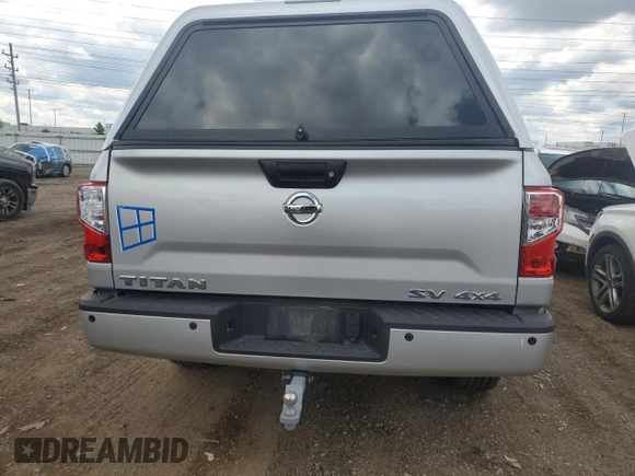 2017 Nissan Titan SV с VIN 1N6AA1C5XHN569612, выставлен на аукционе Copart как лот 58934945 с пробегом 65 995 миль миль и Списание • Salvage title. История ставок и продаж доступна на DreamBid. Изображение 6.