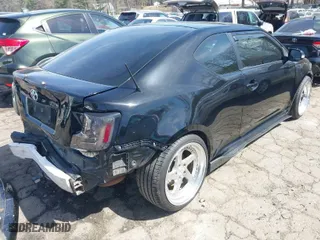 2012 Scion tC with VIN JTKJF5C78C3044543, listed as a IAAI auction lot 41816081 with 234,622 mi miles. Bid and sale history available at carsss.com. Image 4.