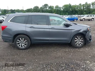 2019 Honda Pilot EX-L with VIN 5FNYF6H5XKB096065, listed as a IAAI auction lot 42631239 with 171,768 mi miles and . Bid and sale history available at DreamBid. Image 13.