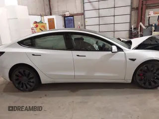 2021 Tesla Model 3 Performance with VIN 5YJ3E1ECXMF991836, listed as a IAAI auction lot 41830519 with Not Provided miles and . Bid and sale history available at carsss.com. Image 13.