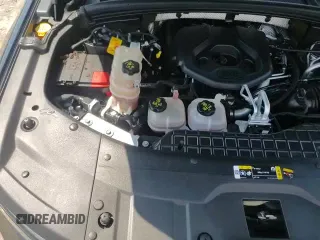 2023 Jeep Grand Cherokee with VIN 1C4RJYB66PC649332, listed as a Copart auction lot 64658955 with 34,504 mi miles and Salvage title. Bid and sale history available at DreamBid. Image 14.