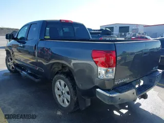 2013 Toyota Tundra 4WD Truck with VIN 5TFUW5F16DX307070, listed as a IAAI auction lot 41306027 with 258,219 mi miles. Bid and sale history available at carsss.com. Image 3.