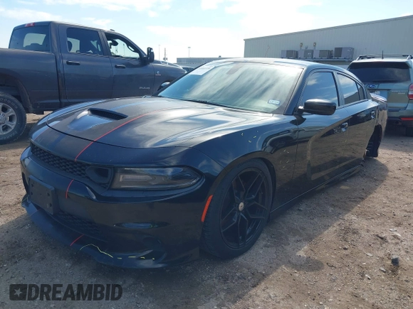 2019 Dodge Charger R/T with VIN 2C3CDXCT2KH575297, listed as a IAAI auction lot 41661339 with 119,854 mi miles and . Bid and sale history available at DreamBid. Image 20.