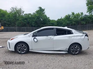 2021 Toyota Prius L Eco with VIN JTDKAMFU6M3137679, listed as a IAAI auction lot 42488129 with 52,414 mi miles and . Bid and sale history available at DreamBid. Image 15.