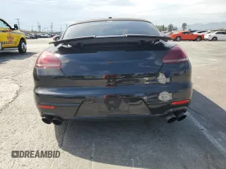 2014 Porsche Panamera Turbo z VIN WP0AC2A72EL073234, wystawiony jako Copart lot #65813464 z przebiegiem 83 918 mil mil oraz Szkoda całkowita • Salvage title. Historia ofert i sprzedaży dostępna na DreamBid. Obrazek 6.