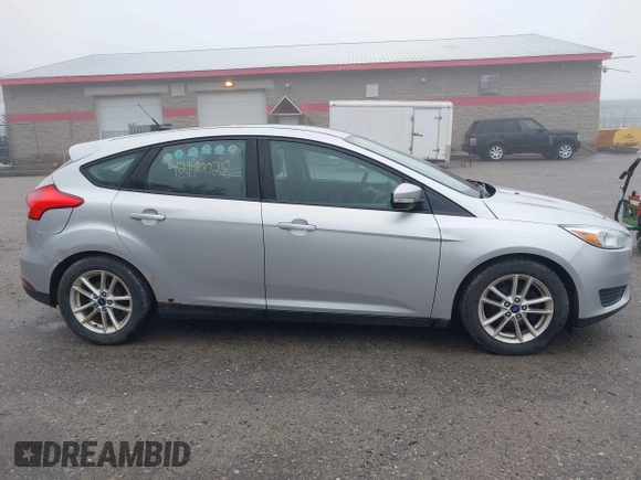 2015 Ford Focus SE with VIN 1FADP3K2XFL364856, listed as a IAAI auction lot 42190028 with 170,436 mi miles. Bid and sale history available at carsss.com. Image 14.