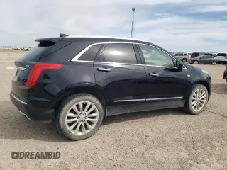 2017 Cadillac XT5 Platinum AWD z VIN 1GYKNFRS1HZ283589, wystawiony jako Copart lot #49140565 z przebiegiem 77 900 mil mil oraz Szkoda całkowita • Salvage title. Historia ofert i sprzedaży dostępna na DreamBid. Obrazek 3.