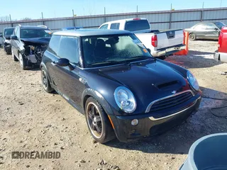 2006 MINI Hardtop S with VIN WMWRE33546TJ34712, listed as a IAAI auction lot 41144701 with 230,006 mi miles and . Bid and sale history available at DreamBid. Image 1.