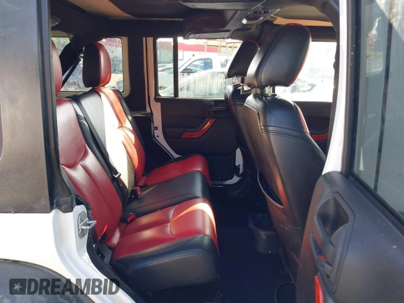 2016 Jeep Wrangler Unlimited Sport z VIN 1C4BJWDG5GL257423, wystawiony jako IAAI lot #42530026 z przebiegiem 157 072 mil mil oraz . Historia ofert i sprzedaży dostępna na DreamBid. Obrazek 8.