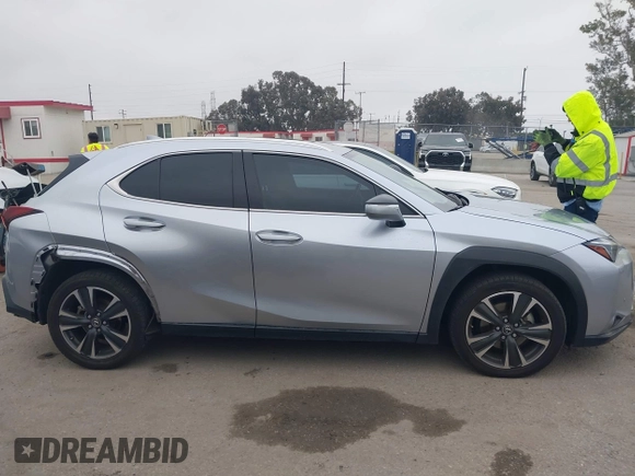 2023 Lexus UX 250h with VIN JTHX6JBH6P2143926, listed as a IAAI auction lot 42180779 with 65,106 mi miles and . Bid and sale history available at DreamBid. Image 14.