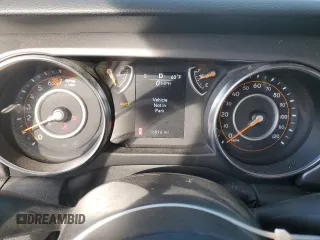 2023 Jeep Wrangler Sport with VIN 1C4HJXDN7PW530536, listed as a Copart auction lot 69664634 with 16,816 mi miles and Salvage Title. Bid and sale history available at DreamBid. Image 9.