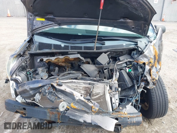 2014 Toyota Sienna L with VIN 5TDZK3DC4ES407928, listed as a IAAI auction lot 41887349 with 208,289 mi miles. Bid and sale history available at carsss.com. Image 10.