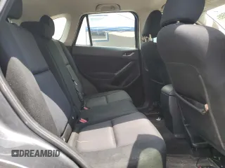 2013 Mazda CX-5 Sport with VIN JM3KE4BE6D0138164, listed as a Copart auction lot 62401595 with 146,305 mi miles and Salvage title. Bid and sale history available at DreamBid. Image 11.