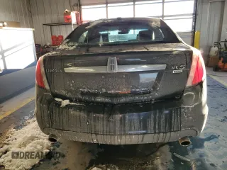 2012 Lincoln MKS с VIN 1LNHL9ER6CG802551, выставлен на аукционе Copart как лот 88782585 с пробегом Не указан миль и Списание • Salvage title. История ставок и продаж доступна на DreamBid. Изображение 6.