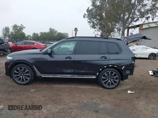 2021 BMW X7 xDrive40i z VIN 5UXCW2C02M9D83199, wystawiony jako IAAI lot #41556053 z przebiegiem 38 926 mil mil oraz . Historia ofert i sprzedaży dostępna na DreamBid. Obrazek 15.