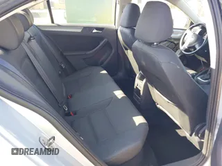 2013 Volkswagen Jetta TDI w/Premium with VIN 3VWLL7AJ0DM385077, listed as a IAAI auction lot 42322406 with 63,428 mi miles and . Bid and sale history available at DreamBid. Image 8.