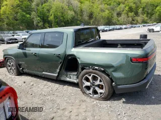 2024 Rivian R1T Adventure z VIN 7FCTGCAA1RN030829, wystawiony jako Copart lot #55557565 z przebiegiem Nie podano mil oraz Szkody całkowita. Historia ofert i sprzedaży dostępna na DreamBid. Obrazek 2.
