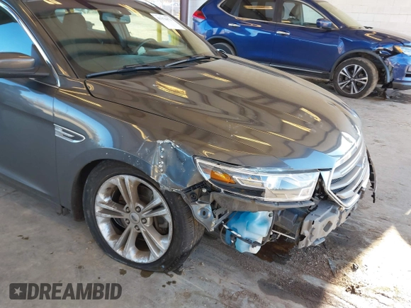 2018 Ford Taurus SEL with VIN 1FAHP2H82JG112785, listed as a IAAI auction lot 41376074 with 98,754 mi miles. Bid and sale history available at carsss.com. Image 6.