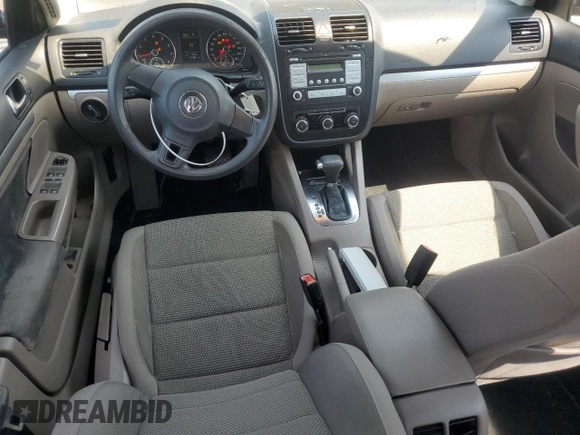 2010 Volkswagen Jetta S with VIN 3VWJX7AJ0AM010023, listed as a Copart auction lot 52379285 with 124,881 mi miles and Salvage title. Bid and sale history available at DreamBid. Image 8.