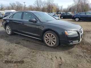2011 Audi A8 with VIN WAUAVAFD9BN001074, listed as a Copart auction lot 51672175 with 130,823 mi miles and Non repairable. Bid and sale history available at DreamBid. Image 4.