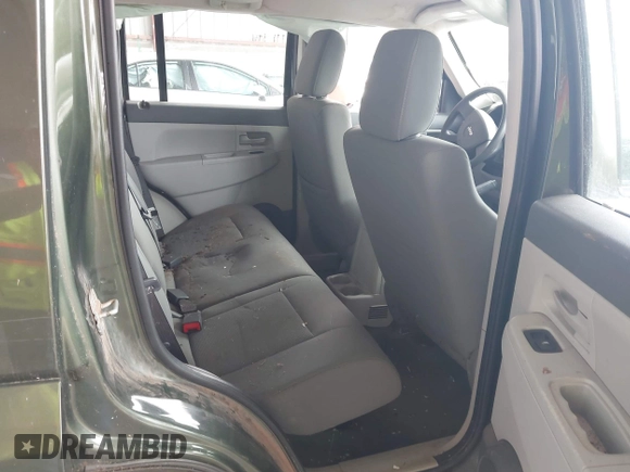 2008 Jeep Liberty Sport with VIN 1J8GN28K98W232003, listed as a IAAI auction lot 42127476 with 129,286 mi miles. Bid and sale history available at carsss.com. Image 8.