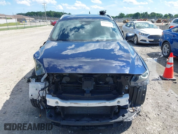 2021 Mazda CX-9 Grand Touring with VIN JM3TCBDY4M0513099, listed as a IAAI auction lot 42563530 with 76,006 mi miles and . Bid and sale history available at DreamBid. Image 13.