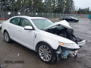 2011 Lincoln MKS EcoBoost with VIN 1LNHL9FTXBG606217, listed as a IAAI auction lot 41776369 with Not Provided miles and . Bid and sale history available at DreamBid. Image 1.