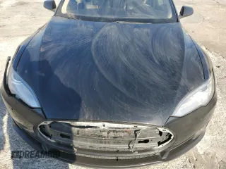 2014 Tesla Model S 60 с VIN 5YJSA1H16EFP40654, выставлен на аукционе Copart как лот 72070974 с пробегом Не указан миль и Списание • Salvage title. История ставок и продаж доступна на DreamBid. Изображение 12.