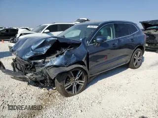 2020 Volvo XC60 Momentum z VIN YV4102DK3L1418415, wystawiony jako Copart lot #75639414 z przebiegiem 14 105 mil mil oraz Szkoda całkowita • Salvage title. Historia ofert i sprzedaży dostępna na DreamBid. Obrazek 1.