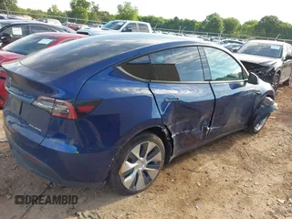 2022 Tesla Model Y Long Range z VIN 7SAYGDEE0NF429399, wystawiony jako IAAI lot #42333630 z przebiegiem 32 937 mil mil oraz . Historia ofert i sprzedaży dostępna na DreamBid. Obrazek 4.