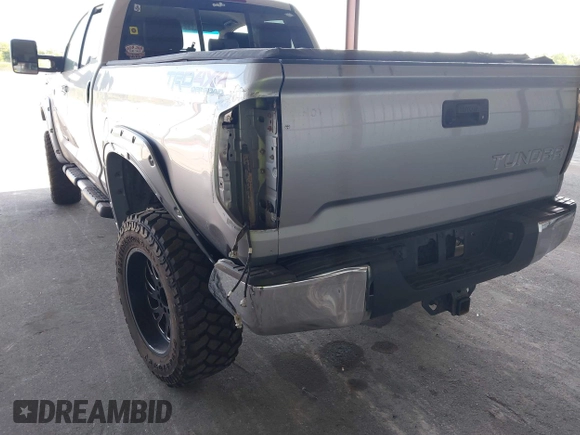2015 Toyota Tundra Limited with VIN 5TFBW5F14FX424723, listed as a IAAI auction lot 42129929 with 222,060 mi miles and . Bid and sale history available at DreamBid. Image 17.