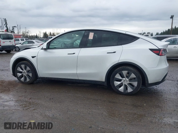 2021 Tesla Model Y Standard Range with VIN 5YJYGDED3MF103499, listed as a IAAI auction lot 41632064 with 132,846 mi miles and . Bid and sale history available at DreamBid. Image 14.