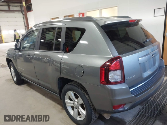 2014 Jeep Compass Sport with VIN 1C4NJDBB5ED567863, listed as a IAAI auction lot 41704644 with 163,405 mi miles. Bid and sale history available at carsss.com. Image 3.