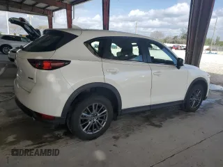 2021 Mazda CX-5 Sport with VIN JM3KFABM4M0388344, listed as a Copart auction lot 50724805 with 24,554 mi miles and Salvage Title. Bid and sale history available at carsss.com. Image 3.