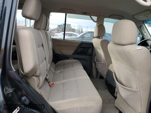 2003 Mitsubishi Montero z VIN JA4NW31SX3J600944, wystawiony jako Copart lot #87611305 z przebiegiem 215 693 mil mil oraz Czysty tytuł • Clean title. Historia ofert i sprzedaży dostępna na DreamBid. Obrazek 11.