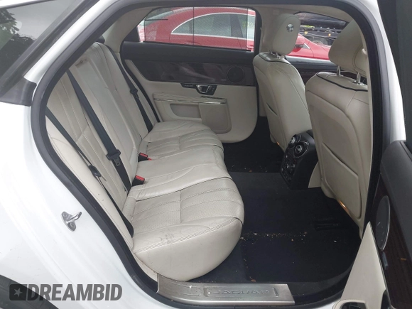 2015 Jaguar XJ Portfolio с VIN SAJWJ2GD2F8V90256, выставлен на аукционе IAAI как лот 42311335 с пробегом 123 299 миль миль и . История ставок и продаж доступна на DreamBid. Изображение 8.