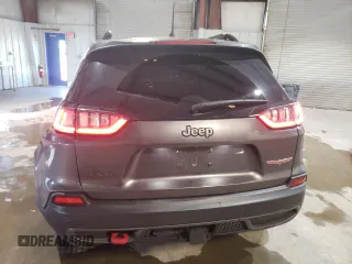 2022 Jeep Cherokee Trailhawk with VIN 1C4PJMBX8ND500503, listed as a Copart auction lot 85705204 with 31,112 mi miles and Salvage Title. Bid and sale history available at DreamBid. Image 6.