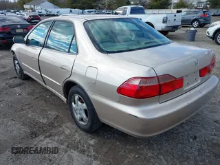 2000 Honda Accord EX z VIN 1HGCG6672YA069215, wystawiony jako IAAI lot #41508330 z przebiegiem 138 721 mil mil oraz . Historia ofert i sprzedaży dostępna na DreamBid. Obrazek 3.