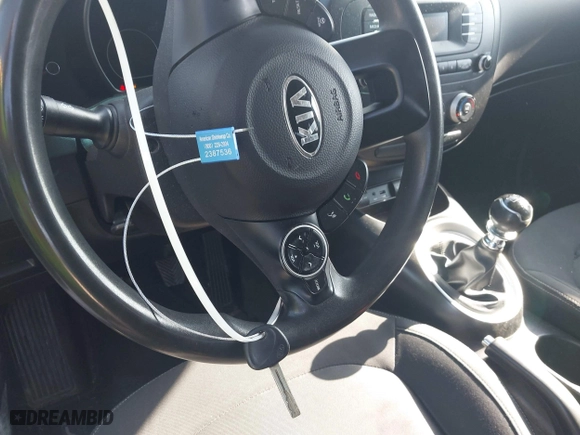 2015 Kia Soul with VIN KNDJN2A22F7770587, listed as a IAAI auction lot 42100497 with 114,933 mi miles. Bid and sale history available at carsss.com. Image 11.