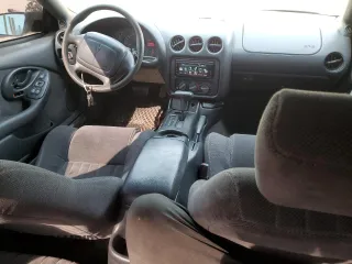1997 Pontiac Firebird with VIN 2G2FS22K8V2212704, listed as a Copart auction lot 48853145 with 130,474 mi miles and Salvage Title. Bid and sale history available at carsss.com. Image 8.