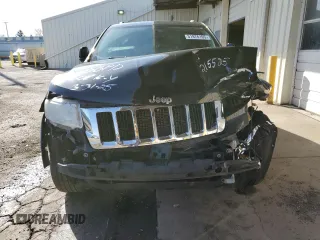 2012 Jeep Grand Cherokee Laredo with VIN 1C4RJEAG2CC215525, listed as a Copart auction lot 51876105 with 148,659 mi miles and Salvage Title. Bid and sale history available at carsss.com. Image 5.
