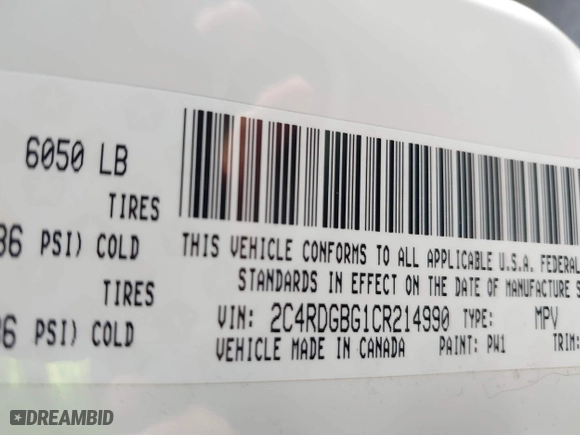 2012 Dodge Grand Caravan SE with VIN 2C4RDGBG1CR214990, listed as a IAAI auction lot 41737352 with 273,821 mi miles. Bid and sale history available at carsss.com. Image 9.